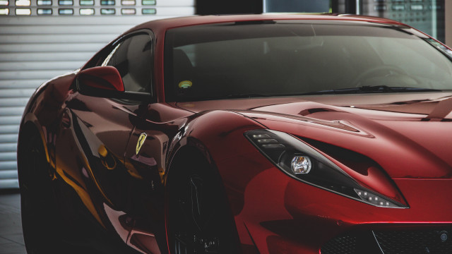 Red sports car garage window free wallpaper - medium preview image