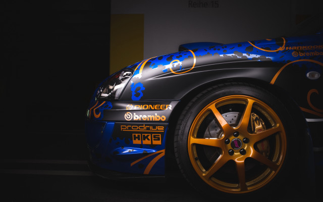 Car blue orange garage yellow free wallpaper - medium preview image