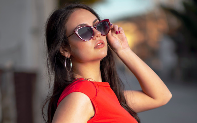Woman red top sunglasses adjusting free wallpaper - medium preview image