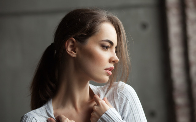 Woman ponytail window portrait blurry free wallpaper for desktop - medium preview image