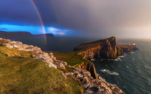 Rainbow ocean cliffs grassy mountains free wallpaper - medium preview image