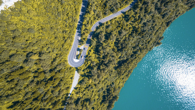 Winding road forest lake car free wallpaper - medium preview image
