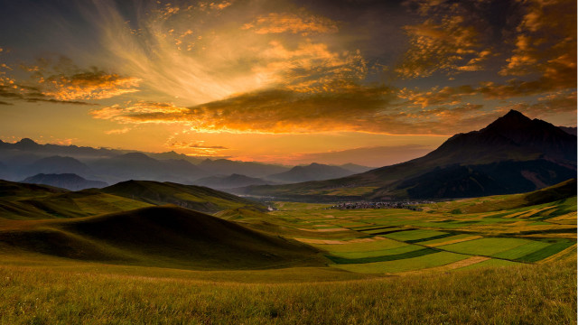 Sunset valley mountains grass dusk free wallpaper - medium preview image