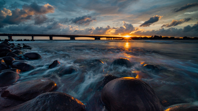 Bridge sunset water rocks dusk free wallpaper - medium preview image