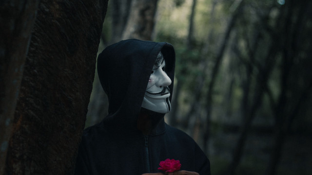 Masked figure flower forest sinister free wallpaper - medium preview image