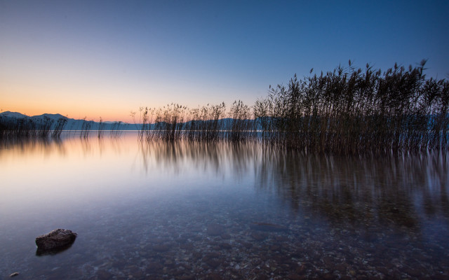 Lake rock sunset trees night free wallpaper - medium preview image