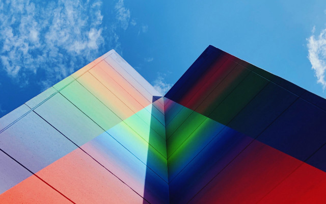 Multicolored building blue sky clouds free wallpaper - medium preview image