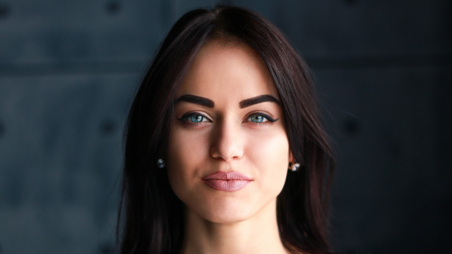 Woman black dress earrings blue free wallpaper - medium preview image