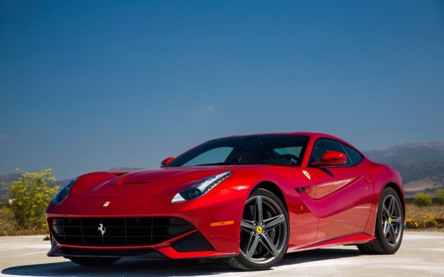 Red ferrari mountains blue sky free wallpaper - medium preview image