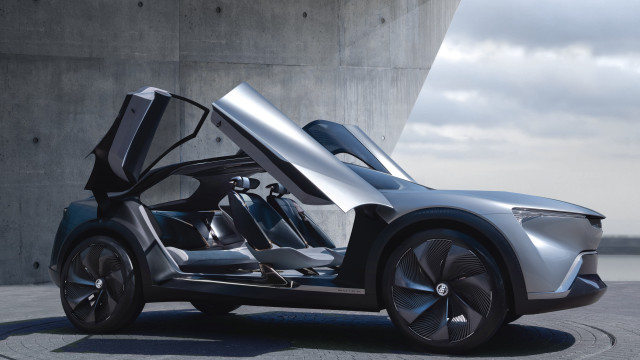 Futuristic car open doors concrete free wallpaper - medium preview image