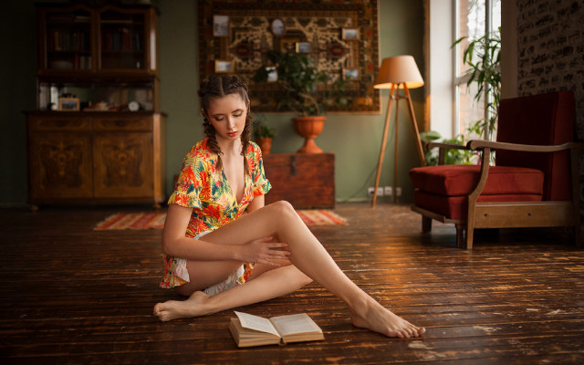 Woman sitting book lamp redchair free wallpaper - medium preview image