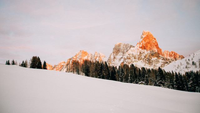 Snowy mountain trees sunset clouds free wallpaper - medium preview image