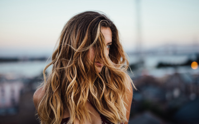Woman longhair cityskyline sunset bokeh free wallpaper - medium preview image