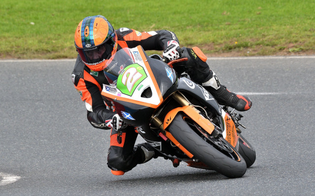 Motorcycle rider race track helmet #2 free wallpaper - medium preview image