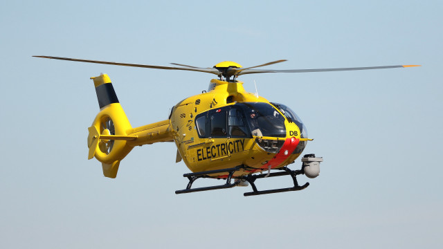 Yellow helicopter blue sky pilot free wallpaper - medium preview image