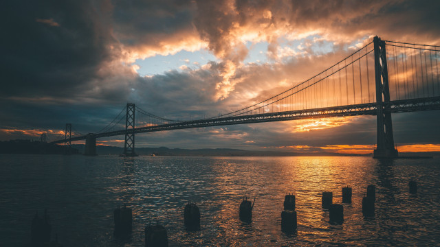 Bridge water sky clouds cityscape free wallpaper - medium preview image