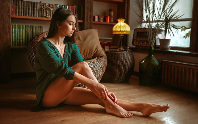 Woman sitting crossed feet indoor free wallpaper - medium preview image