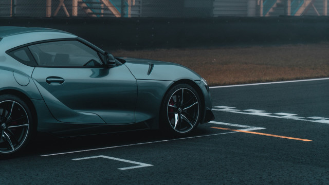 Blue sports car road building free wallpaper - medium preview image