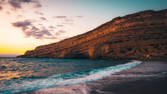 Beach waves cliff lighthouse sunset free wallpaper - medium preview image