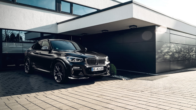 Black car building garage tree free wallpaper - medium preview image