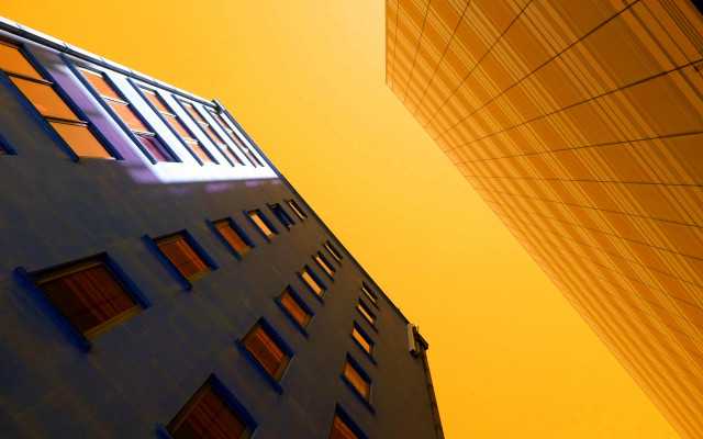 Tall building windows yellow sky free wallpaper - medium preview image