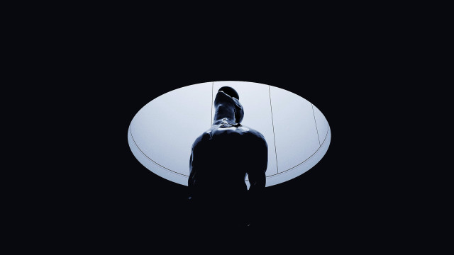 Person round object dark light free wallpaper - medium preview image
