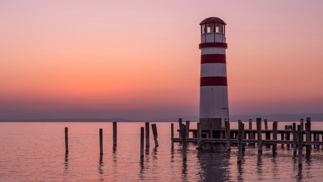 Lighthouse dock sunset water berndfasching free wallpaper - medium preview image