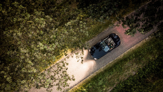 Car forest night tilt shift free wallpaper - medium preview image