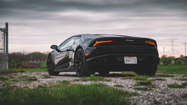 Black sports car field cloudy free wallpaper - medium preview image