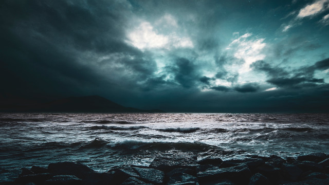 Dark ocean cloudy sky mountain free wallpaper - medium preview image