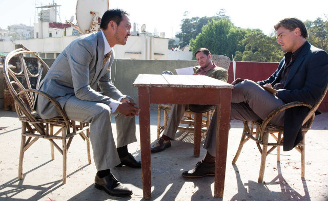 Two men talking courtyard table free wallpaper - medium preview image