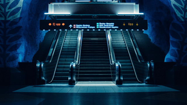 Futuristic escalator blue wall clock free wallpaper - medium preview image