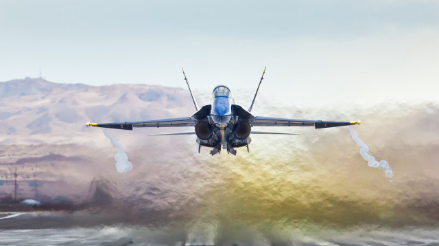 Jet over water mountains smoke free wallpaper - medium preview image