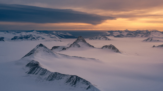 Snowy mountains cloudy sunset landscape free wallpaper - medium preview image