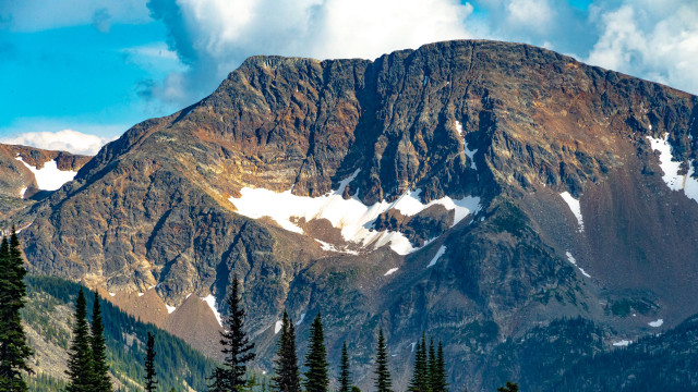 Snowy mountain forest blue sky free wallpaper - medium preview image