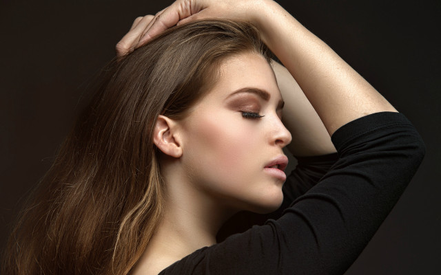 Woman long hair touching head free wallpaper - medium preview image