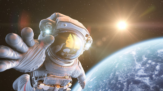 Space suit man waving planet free wallpaper - medium preview image