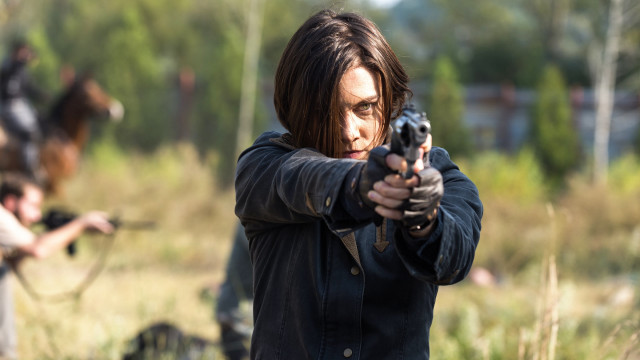 Woman gun field background blurred free wallpaper - medium preview image