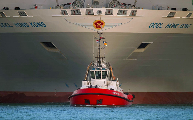 Large boat near ship flag free wallpaper - medium preview image