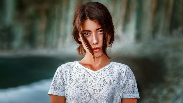 Surprised woman brown eyes outdoors free wallpaper for desktop - medium preview image
