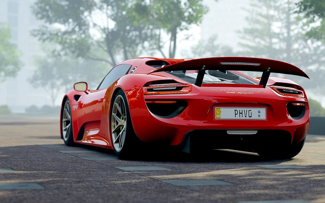 Red sports car foggy street free wallpaper - medium preview image