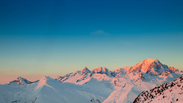 Mountain range snowy horizon sunset free wallpaper - medium preview image
