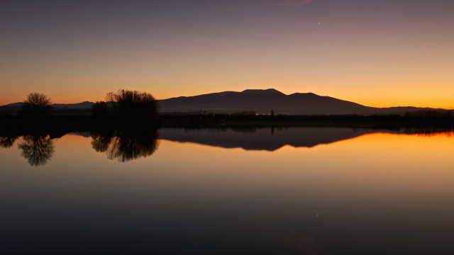 Lake mountain sunset trees symmetry free wallpaper - medium preview image