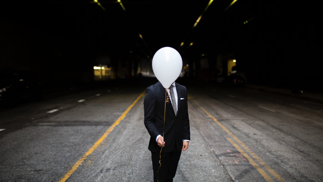 Surreal man suit balloon street free wallpaper - medium preview image