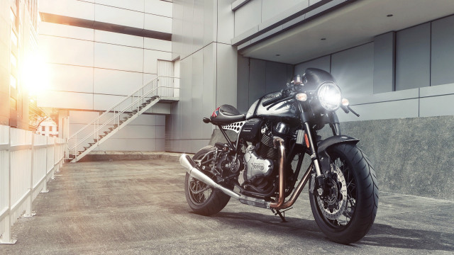 Motorcycle parking lot building staircase free wallpaper - medium preview image