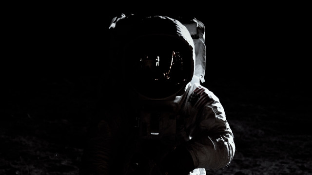 Space suit astronaut dark flashlight free wallpaper - medium preview image