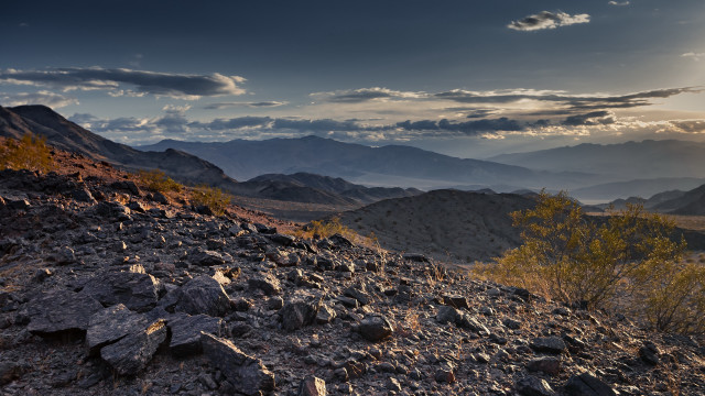 Rocky hillside mountains sunset clouds free wallpaper - medium preview image