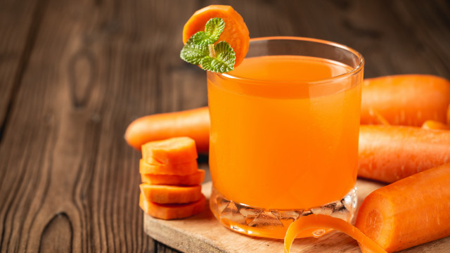 Carrot juice garnish wooden table free wallpaper - medium preview image