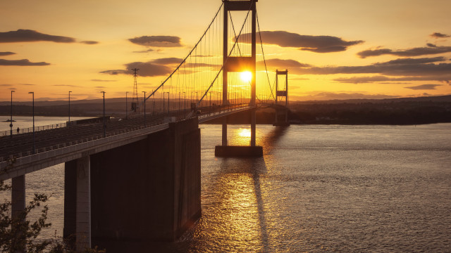 Bridge sunset water lighthouse city free wallpaper - medium preview image