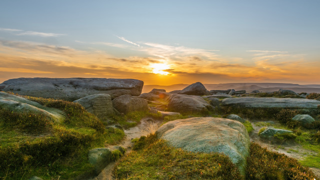 Sunset rocky landscape grass rocks free wallpaper - medium preview image